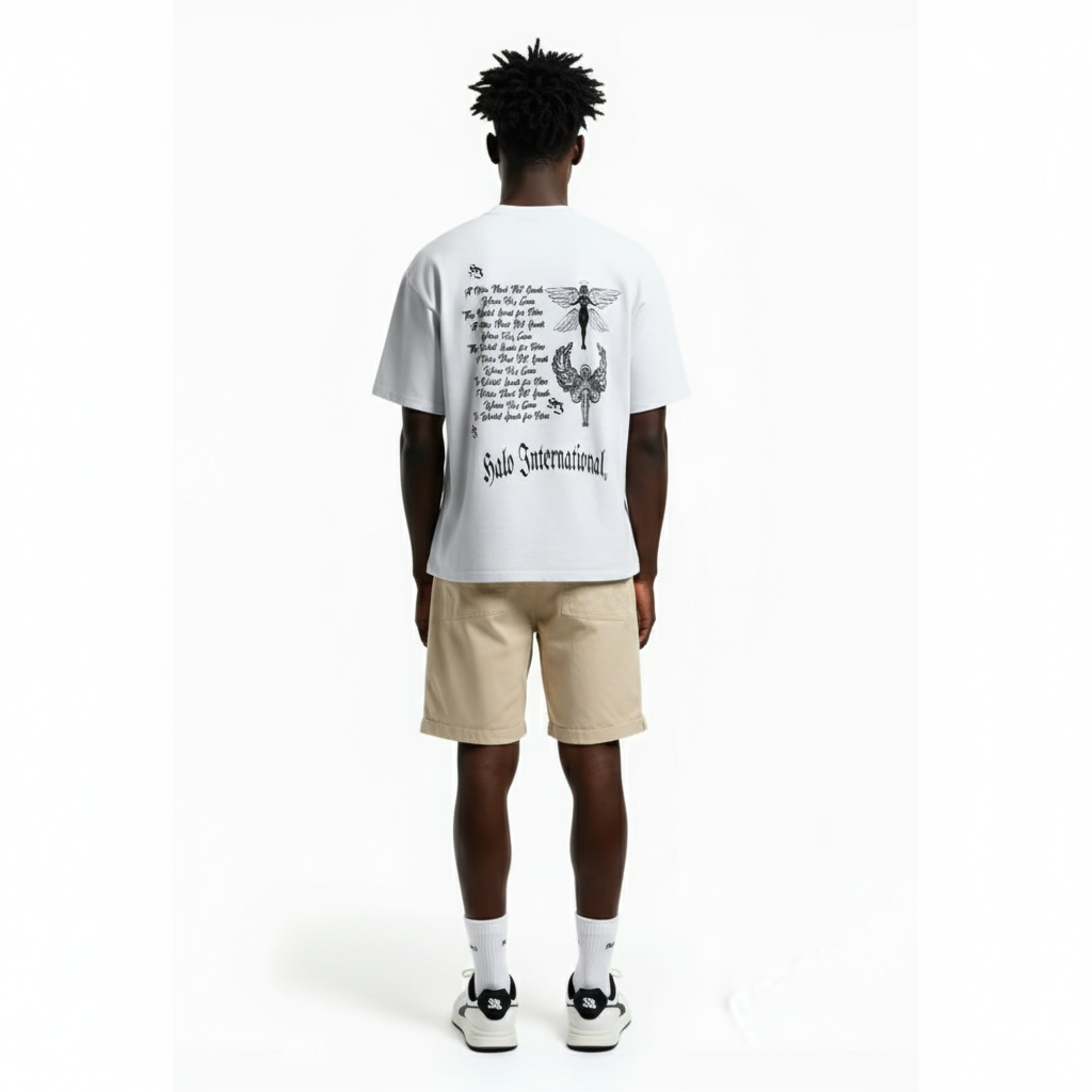 Person wearing a white t-shirt with text and graphics on the back, standing against a white background